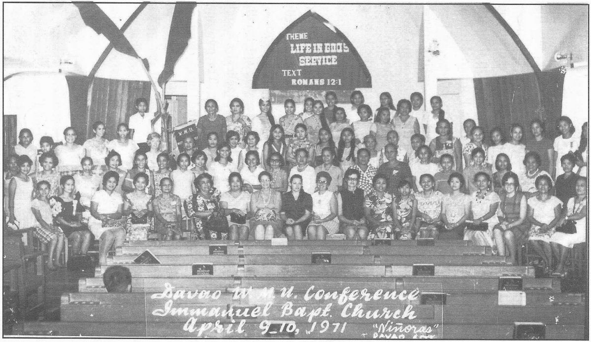 Large congregation gathered inside Immanuel Baptist Church beneath a banner reading Davao W.M.U. Conference.