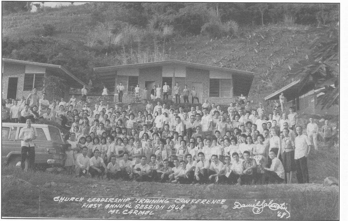 Several hundred delegates assembled on a hillside at the Mt. Carmel campground.